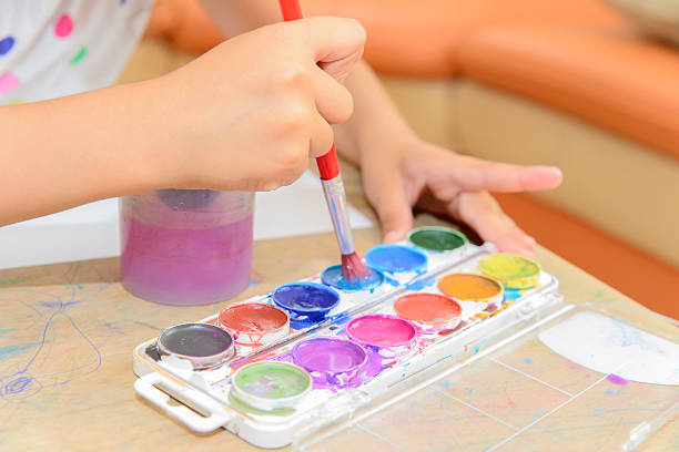istock Little Girl Painting 483655044