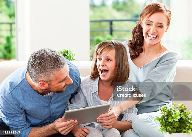 Happy Family With Digital Tablet Stock Photo - Download Image Now - Digital Tablet, Ecstatic, Excitement