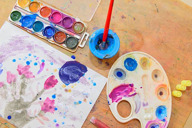 istock Little Girl Painting 483655804