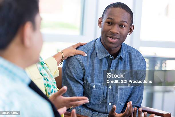 Teenage Boy Explaining Something In Group Meeting Stock Photo - Download Image Now - Teenager, Support, African-American Ethnicity