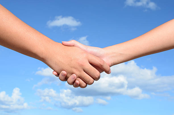istock Hand shake between a man and woman 483656031