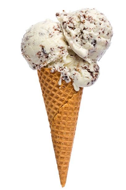 Ice cream cone with three scoops of stracciatella ice cream stock photo