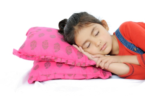 Indian Girl sleeping over pillow.