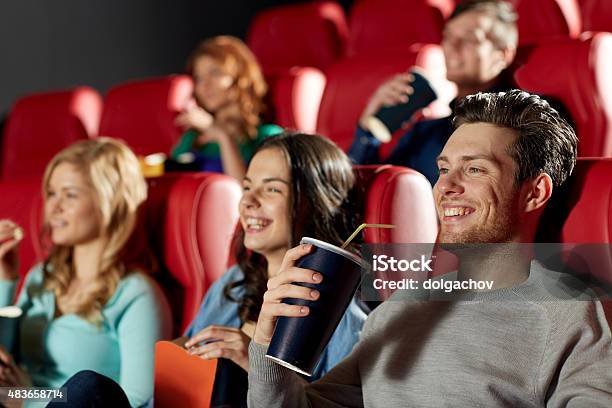 Happy Friends Watching Movie In Theater Stock Photo - Download Image Now - Movie Theater, Film Industry, Movie