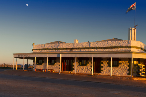 Early morning and the moon, shining on The Birdsville Pub.