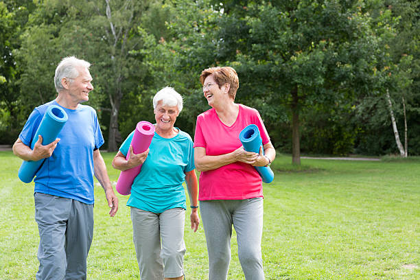 istock Seniors - gymnastics in the park 483659452