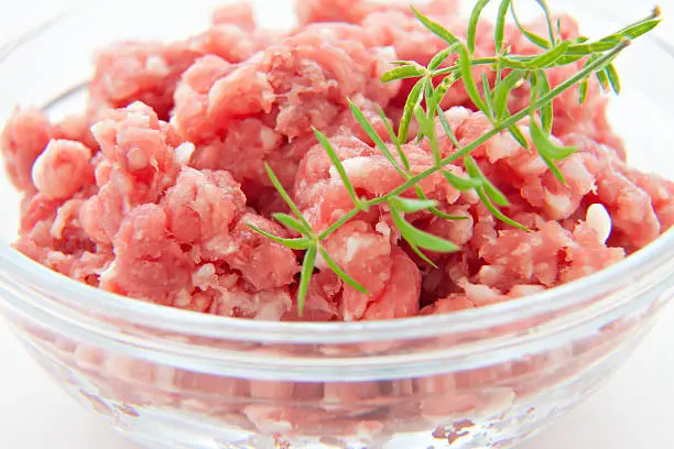raw uncoocked minced meat food isolated at white background