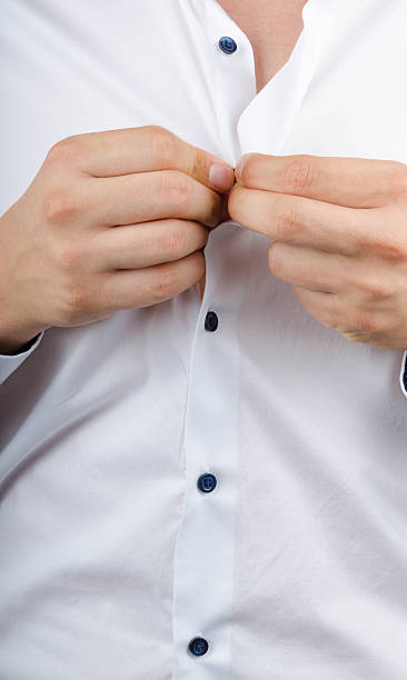 istock Businessman Buttoning his Shirt 483659600