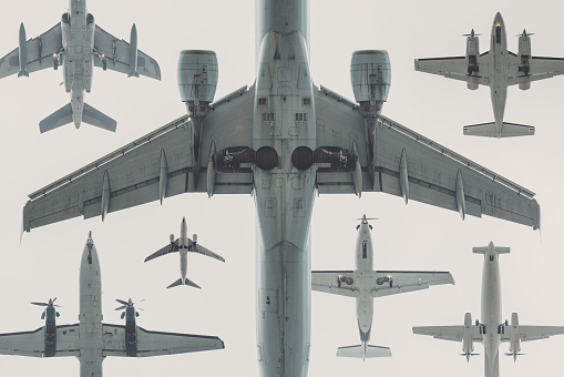 A wide variety of aircraft from below.  Composite image.