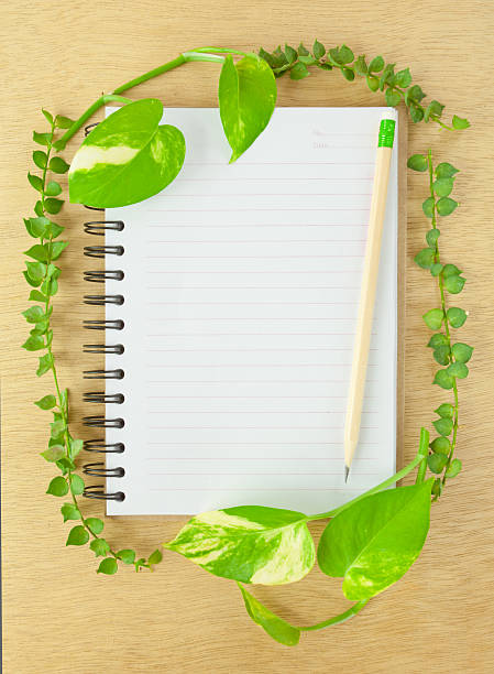 istock recycle notebook and wooden pencil 483660823