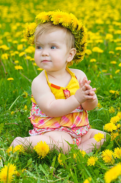 istock Happy little girl  on the meadow 483660979