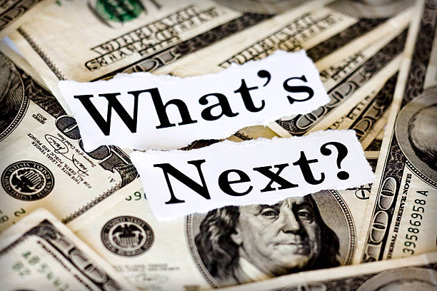 What's Next Hundred dollar bills with the words "What's Next?" recession stock pictures, royalty-free photos & images