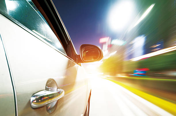 istock Car driving fast down in the city 483662108