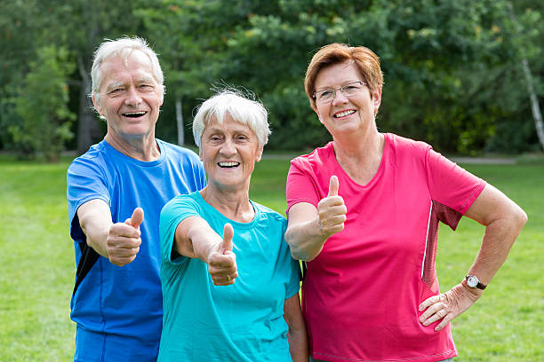 istock Seniors - gymnastics in the park 483663576