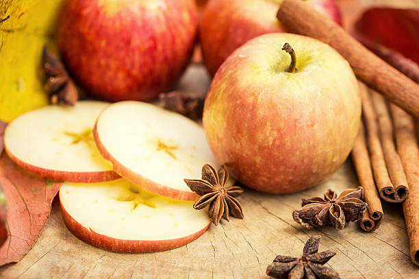 istock Apples with star anise. Autumn composition with leaves and apples. 483666612