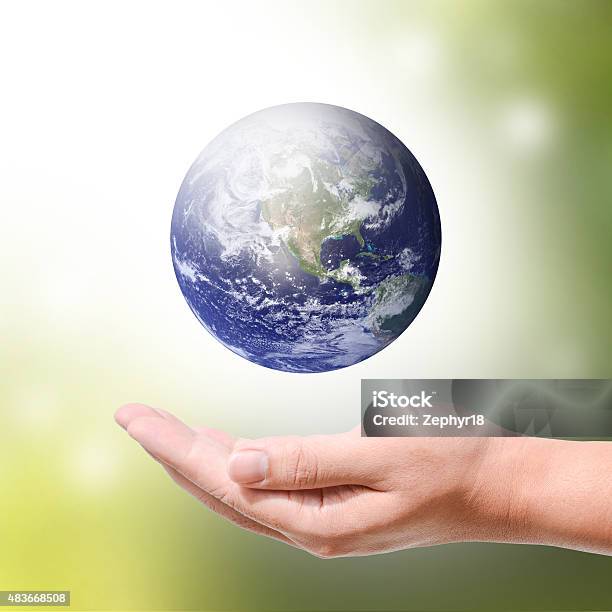 Male Hand Holding The Earth Stock Photo - Download Image Now - 2015, Blue, Business