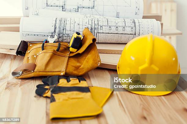Wooden Table With Work Tools Stock Photo - Download Image Now - Art And Craft, Belt, Blueprint