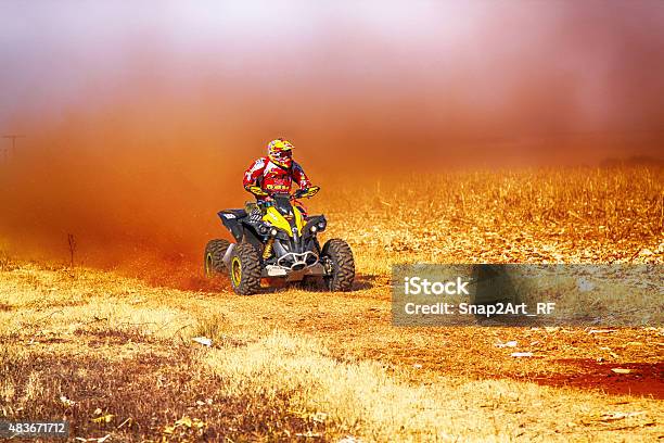 Hd Quad Bike Kicking Up Trail Of Dust Stock Photo - Download Image Now - 2015, Activity, Authority