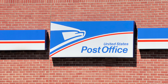 Rochester Hills, Michigan, USA - June 2, 2011: The United States Post Office on Rochester Road in Rochester Hills, Michigan. The US Postal Service was founded in 1775 with Benjamin Franklin as its first postmaster and today employs almost 600,000 people.