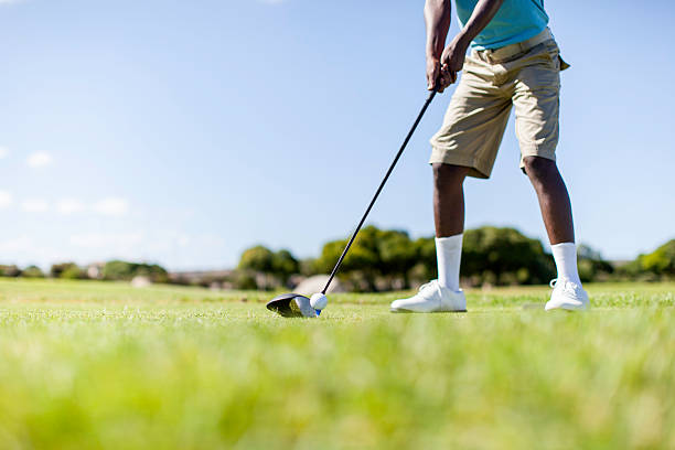 istock African golfer ready to drive the golf ball 483671935