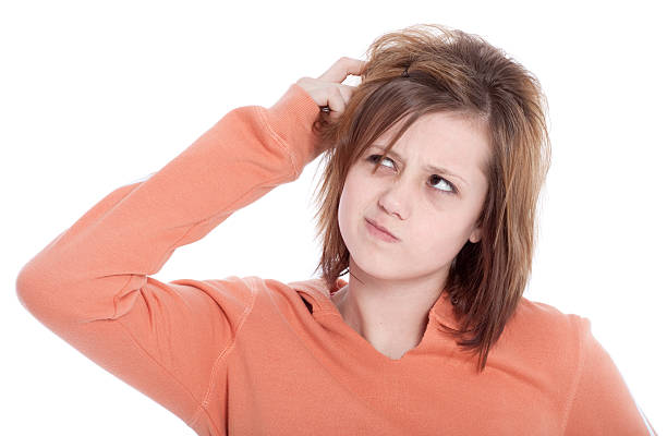 istock Teenage Girl Scratching Head with Thinking Expression Isolated on White 483672345