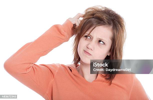 Teenage Girl Scratching Head With Thinking Expression Isolated On White Stock Photo - Download Image Now