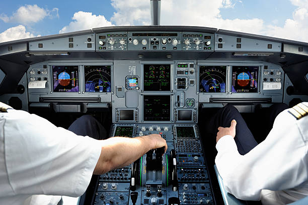 istock Pilots in Cockpit of Modern Jet Aircraft 483673437