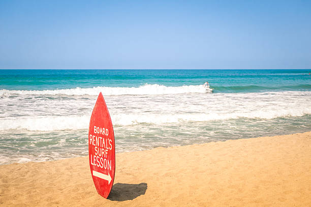 Surfboard at exclusive beach - Surfing school destinations worldwide Surfboard at exclusive beach - Surfing school destinations worldwide Mentawai Islands stock pictures, royalty-free photos & images