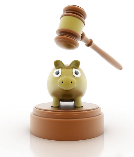 istock Breaking a sad piggy bank 483677759