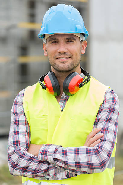 istock Portrait of young entrepreneur on buiding site 483678366