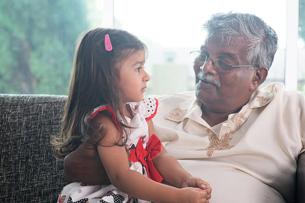 istock Grandfather and granddaughter communication 483683966