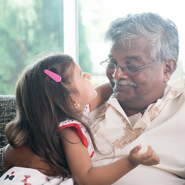istock Granddaughter and grandfather 483683974
