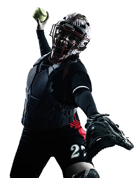 istock woman playing softball players silhouette isolated 483684544