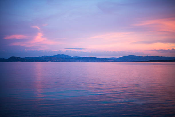 istock calm evening sunset scene at the water at Golfo Aranci, Sardinia, 483687030