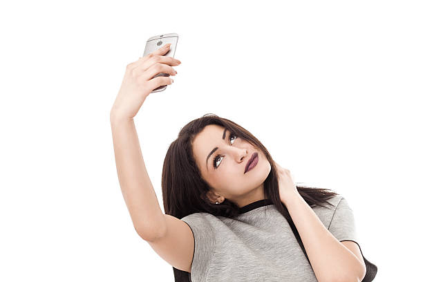istock Pretty woman portrait taking a selfie 483687930