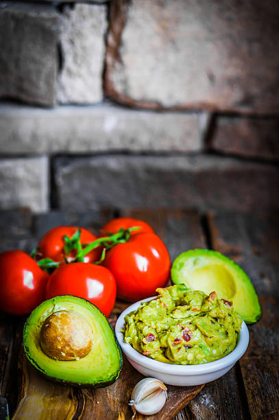 istock Guacamaole with bread and avocado on rustic wooden background 483688213