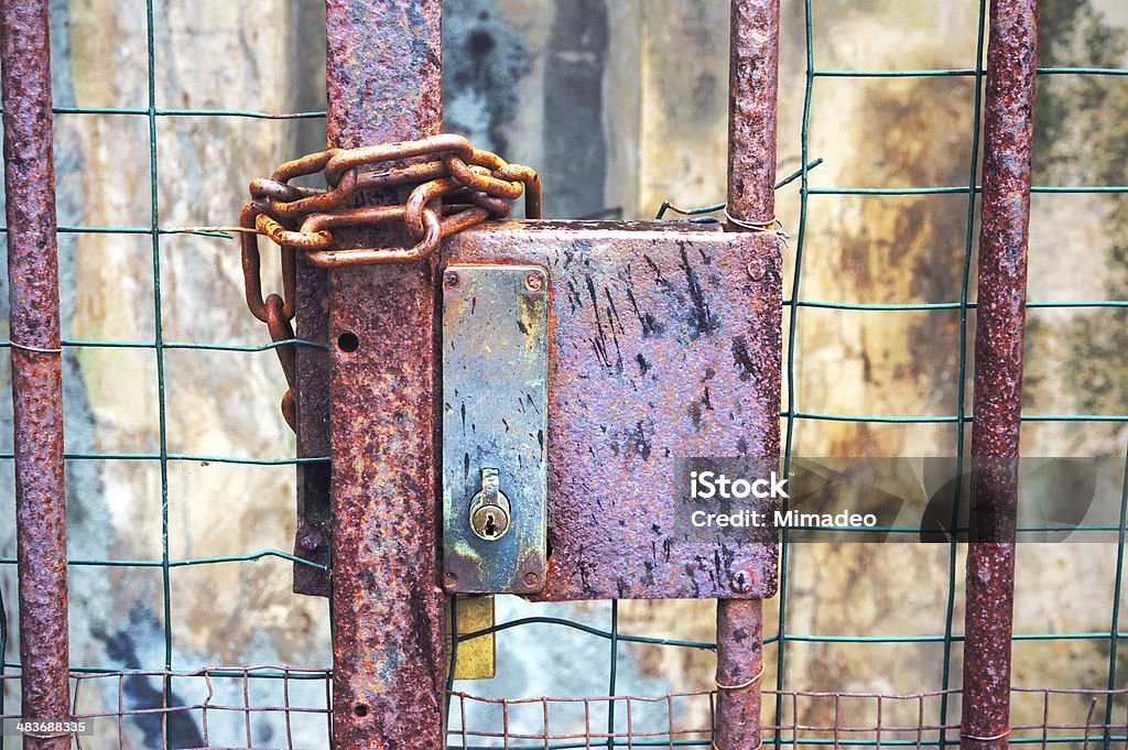 gate closed with lock and chains gate closed with a lock and chains Ancient Stock Photo