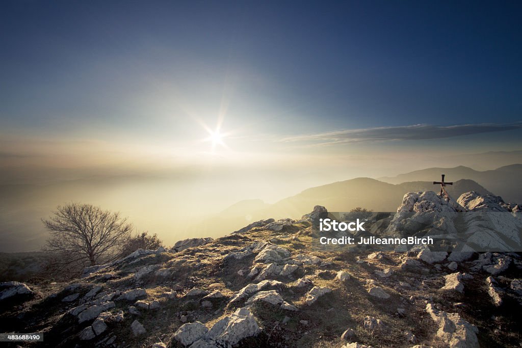 Sunlight on top of mountain peak 1200m above sea level, Mare de Deu Mountain range in Garrotxa region, Spain Garrotxa Stock Photo