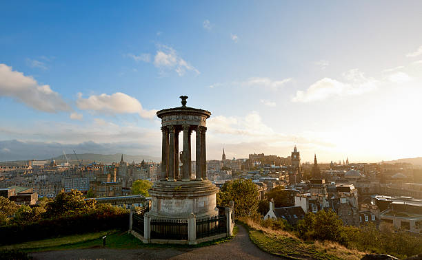 Edinburgh skyline with Edinburgh castle in the background seen from Calton Hill at sunset, Scotland UK