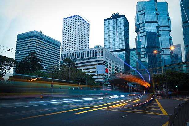 istock Road light trails on streetscape buildings in HongKong 483689633
