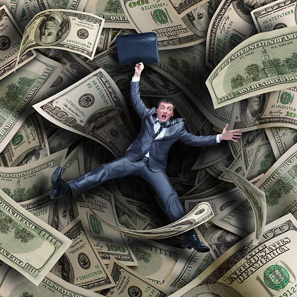 istock Businessman falling into financial tunnel 483689681