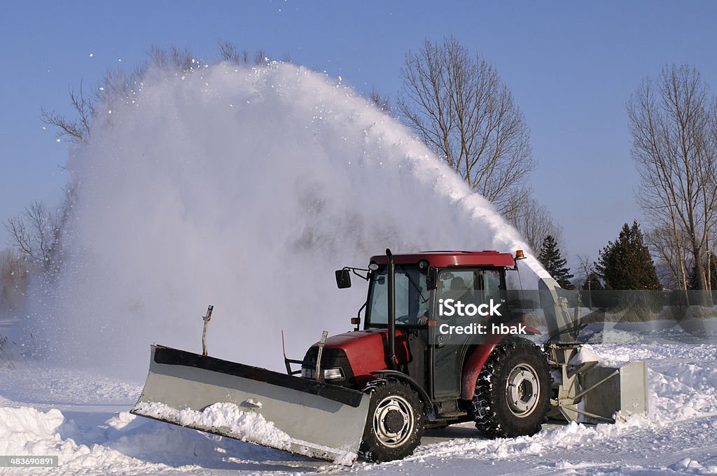 Tractor  snow blower Tractor snow blower after a snowstorm Activity Stock Photo