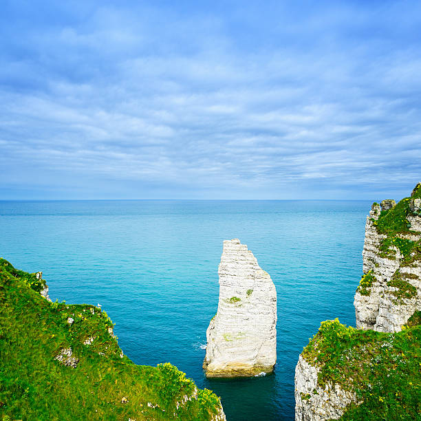 istock Etretat Aval cliff rock landmark, blue ocean . Normandy, Fran 483690979