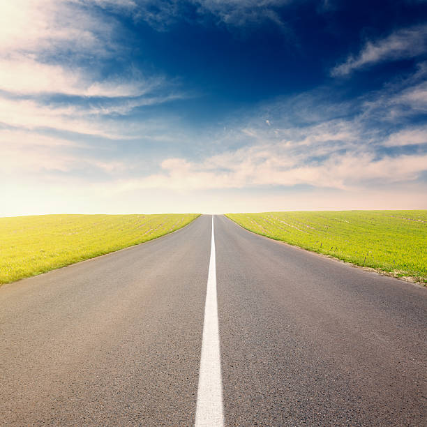 istock Driving on an empty asphalt road at sunny day 483691649