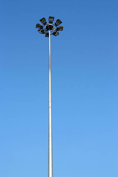 istock street lamp tower on blue sky 483692211