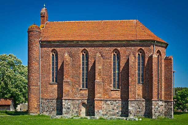 Summer view of an old brick military chapel built in the thirteenth century by the Knights Templar, Chwarszczany, Poland