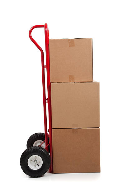 istock Brown cardboard moving box on white with a fragile sticker 483694217
