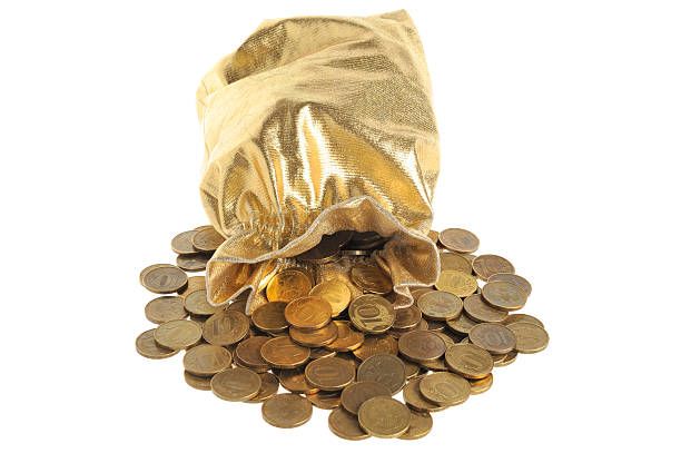 istock Gold sack with scattered coins isolated on white 483694371