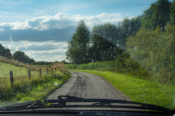 istock pov driving on a small rural road 483701532
