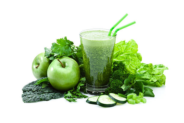 Green vegetable juice isolated on white background